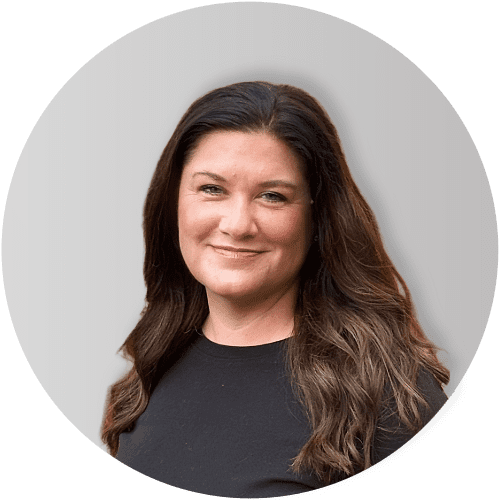 Female dr with long brown hair wearing a black tshirt